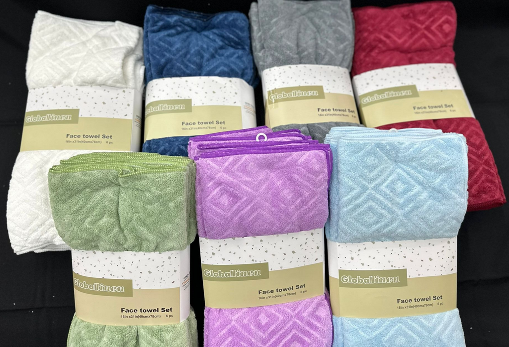 Set of face towel sets in various colors with visible brand labels.