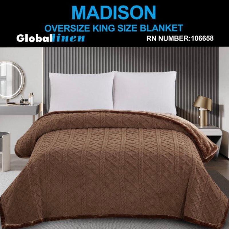 Brown oversized king size blanket on a bed with 'Madison' and 'Global Linen' branding.