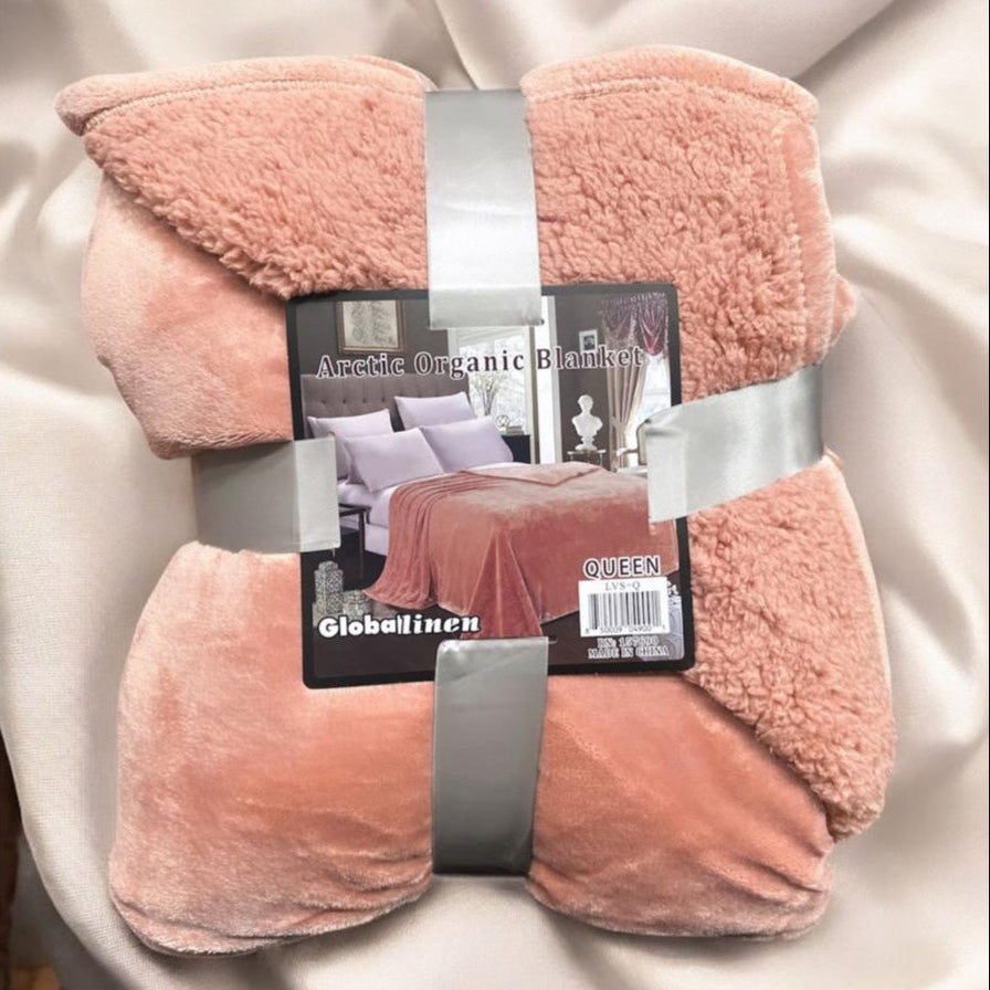 Pink blanket with packaging on a light background