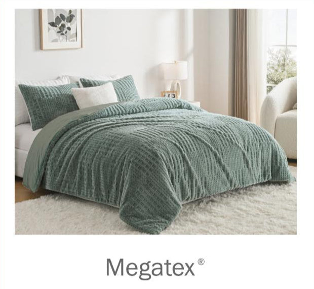 Green textured comforter on a bed in a bedroom with Megatex branding.
